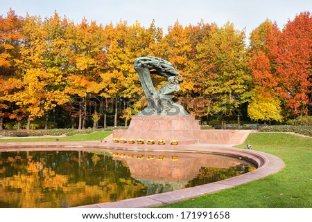Fryderyk Chopin monument in autumn scenery of the Royal Lazienki Park in Warsaw, Poland, designed around 1904 by Waclaw Szymanowski (1859-1930).