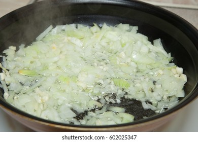 Fryer, Hot Oil, Onion, Garlic For Cooking Meatballs Or Stuffed Cabbage Lazy