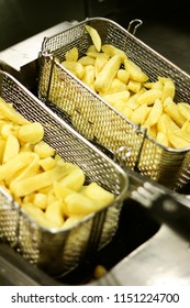 Frying Chipped Potatoes In Deep Fat Fryer