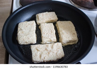 Frying Coated Cheese Eidam In Breadcrumbs