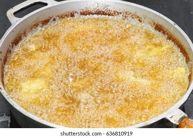 Frying Food In A Pan With Hot And Boiling Oil.