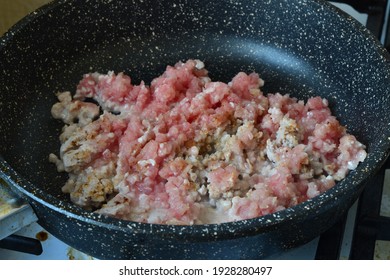 Frying minced meat in a pan