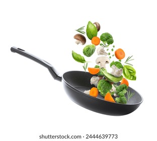 Frying pan with fresh ingredients in air on white background - Powered by Shutterstock