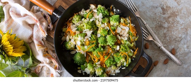 frying pan with fried romanesco cauliflower on light table