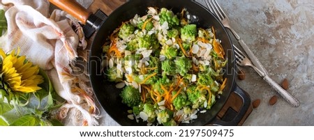 frying pan with fried romanesco cauliflower on light table