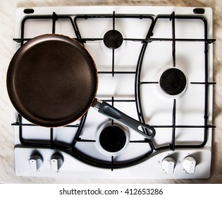 Frying Pan On Gas Stove, Top View