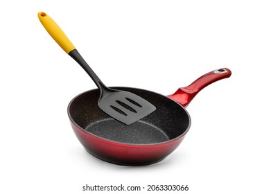 Frying Pan With Plastic Spade On White Background.