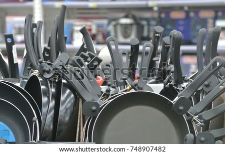 frying pans, handles,one griddle and many handles