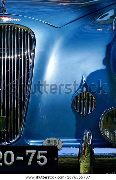 Ft. Myers, Florida/USA -\
March 1, 2020: A vertical image of the details of a vintage baby\
blue convertible Lagonda at an antique car show in southwest\
Florida.          