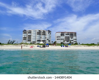 Ft Pierce,FL/USA-6/22/19: Condominiums Along The Atlantic Coastline That Have There Hurricane Shutters On Preparing For The Storm Season.  The Snowbirds Have Gone For The Summer.