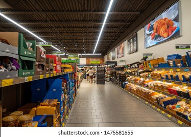 Ft. Pierce,FL/USA-810/19: People shopping in the bread aisle of an Aldi store.