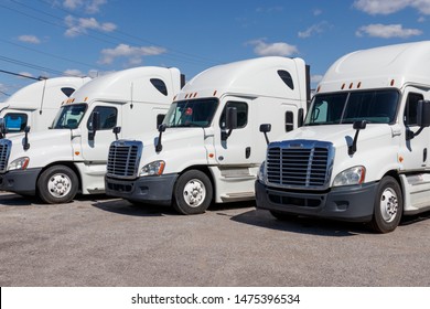 Ft. Wayne - Circa August 2019: Freightliner Semi Tractor Trailer Trucks Lined Up For Sale VII