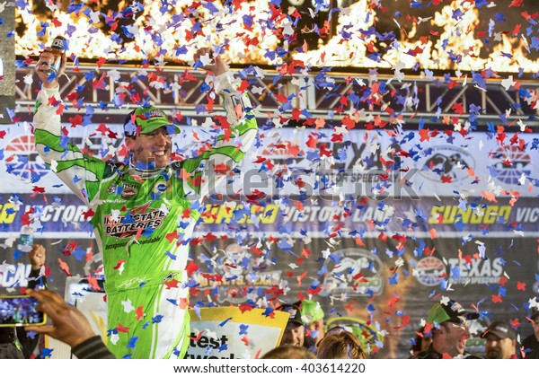 Ft. Worth, TX - Apr 10,
2016: Kyle Busch (18) celebrates in victory lane after winning the
Duck Commander 500 at the Texas Motor Speedway in Ft. Worth,
TX.


