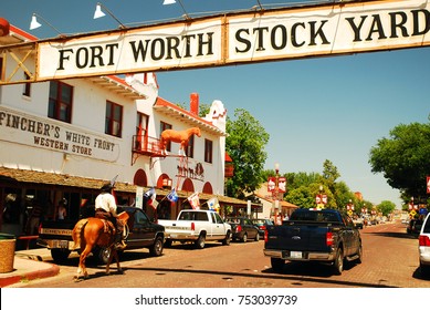 Ft Worth, TX, USA May 18 A Mounted Police officer patrols the Ft Worth Stockyards in Texas.  The officers ride horseback as homage to the historic nature of the stockyards