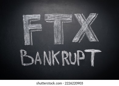 FTX bankrupt is written in white chalk on a black board. Close-up. Concept of bankruptcy and collapse of FTX cryptocurrency exchange - Shutterstock ID 2226220903