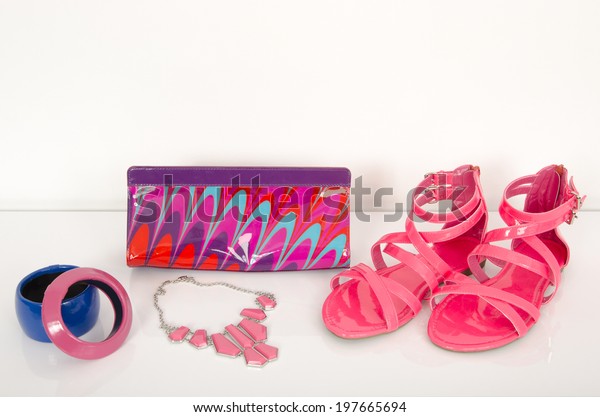 pink sandals and matching bag