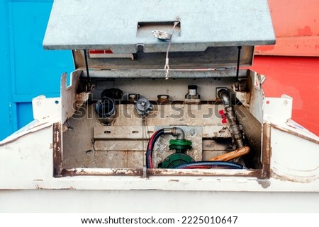 Fuel bowser pump with manual hand fuel pump to store diesel fuel on construction site and farm in three colors similar to the Russian banner  concept