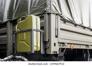 Fuel Canisters Are Fixed On The Body Of A Military Vehicle