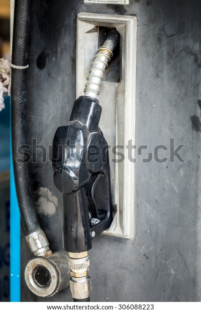 Fuel dispenser at a\
gasoline station