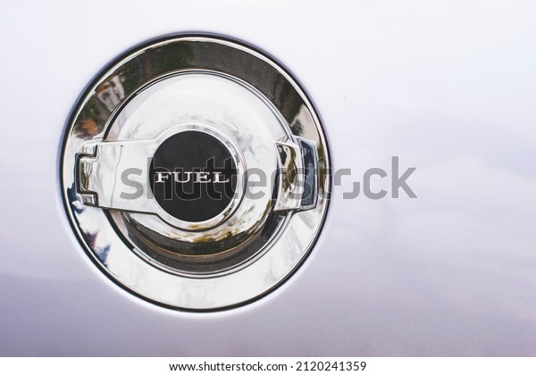 Fuel door hatch on a car\
close up