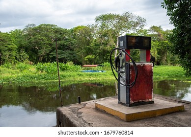 Fuel Gas Station Pump Outdoor For Boats Next To A River Stream In The Rainforest In Nicaragua Close To Granada