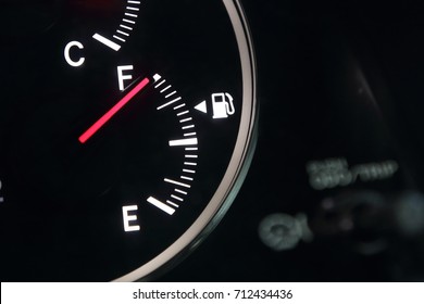 Fuel gauge showing full car fuel