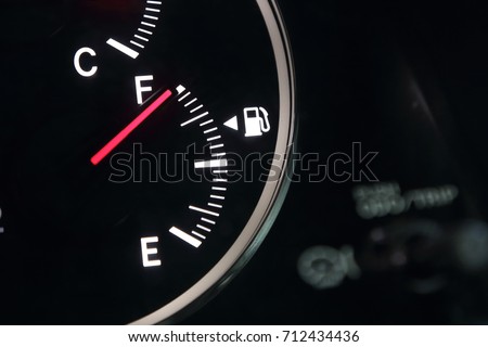 Fuel gauge showing full car fuel