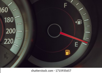 Fuel gauge with warning indicating low fuel tank