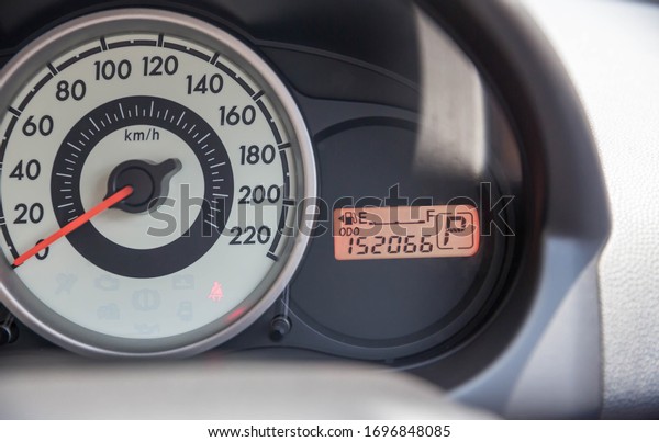 Fuel gauge with warning indicating low fuel tank, gas\
gauge indicating icon for gas station.  empty Petrol, gasoline\
gauge dash board in car with digital warning sign of run out of\
fuel turn on.