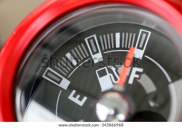 Fuel gauge with\
warning indicating quantity fuel tank,Gas gauge indicating white\
icon for gas station.