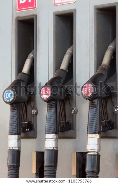 fuel guns at the gas\
station