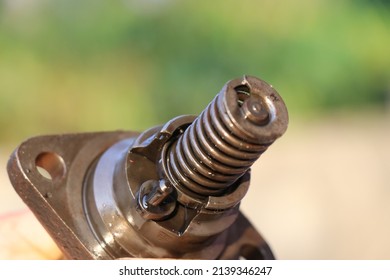 Fuel Injector Spring Part Closeup With Oil All Over The Body, Fuel Injecting Part Inside Combustion Chamber Of IC Engine