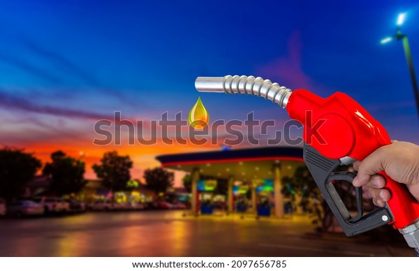 Fuel nozzle Hand holding Oil extracted from
the background,
clipingpart