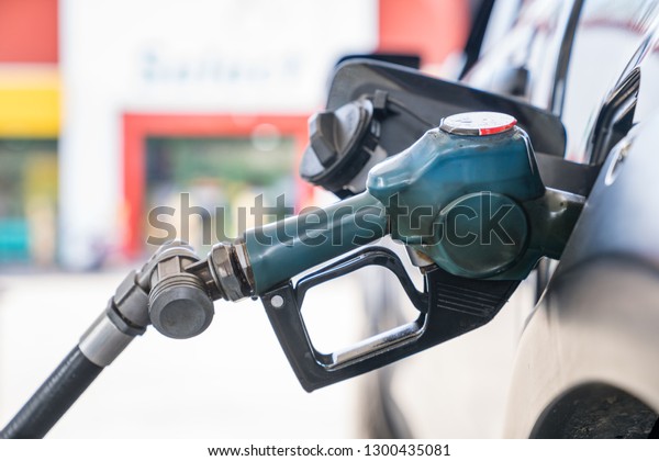 Fuel supply,\
Gasoline station gas pump in\
car