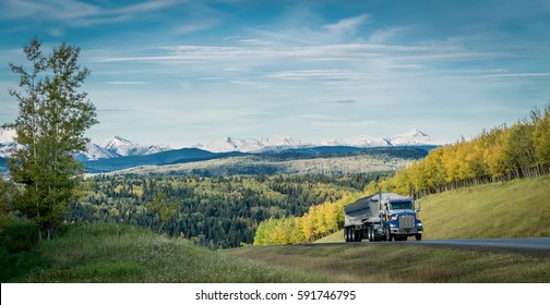 Fuel tanker track driving on the mountain road in Canada