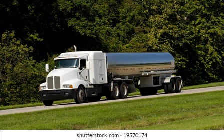 A fuel tanker transport truck on a highway, fuel transportation