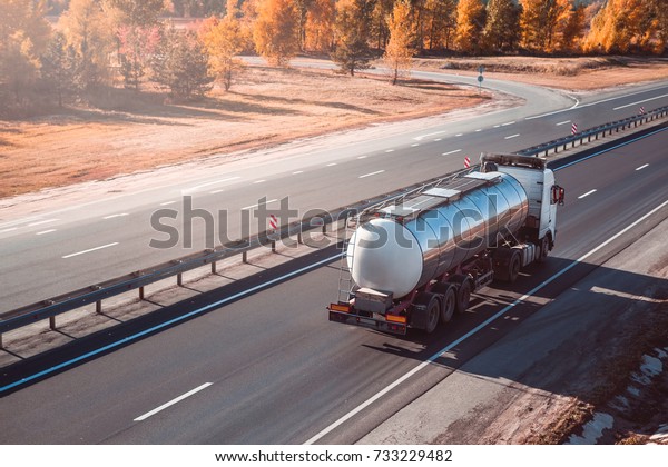 fuel tanker truck. on the\
road.