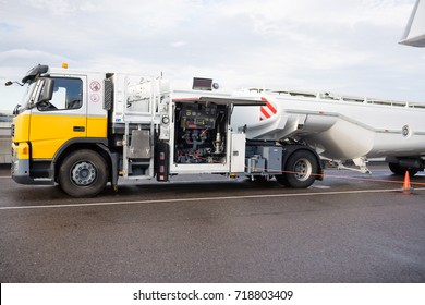 Fuel Truck On Wet Runway At Airport