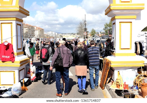Fuengirola, Costa del Sol, Spain. March\
30, 2019.  Crowds of people attending and enjoying the Saturday\
outdoor market at Fuengirola on the Costa del Sol in\
Spain.