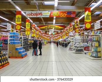 FUENLABRADA, MADRID, SPAIN - FEBRUARY 13, 2016: People Shopping for diverse products in Alcampo supermarket. Alcampo is a subsidiary of the Auchan hypermarkets group in Spain 