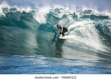 Fuerteventura - 2016-10-23: Training Athlete Surfing During A Winter Training Session In Fire