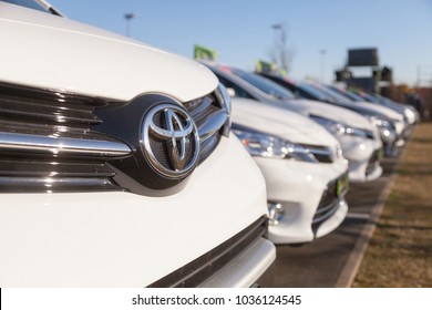 FUERTH / GERMANY - FEBRUARY 25, 2018: Toyota logo on a car. Toyota Motor Corporation is a Japanese multinational automotive manufacturer headquartered in Toyota, Aichi, Japan.