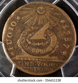 Fugio Copper Coin Was The First Coin To Be Issued By The New United States In 1787. Many Historions Say That Benjamin Franklin Helped To Design This First American Coin.