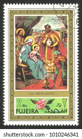 Fujeira - Circa 1971: Stamp Printed By Fujeira, Color Edition On Christmas Art, Shows Painting The Three Wise Men, Circa 1971