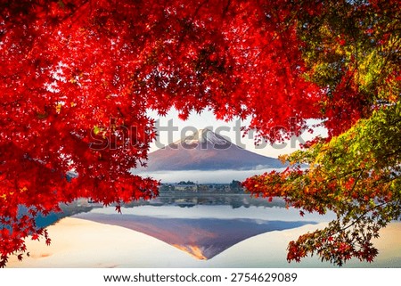 Fuji Mountain Reflection and Red Maple Leaves with Morning Mist in Autumn, Kawaguchiko Lake, Japan