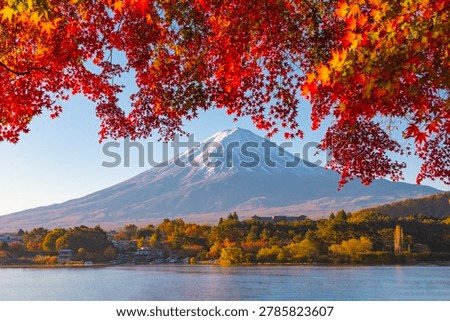 Fuji Mountain Reflection and Red Maple Leaves with Morning Mist in Autumn, Kawaguchiko Lake, Japan