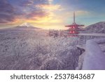 Fujiyoshida, Japan Beautiful view of mountain Fuji and Chureito pagoda at sunrise of Mount Fuji during winter.This is one of the famous spot to take pictures of Mount Fuji.