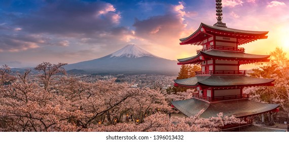 Fujiyoshida, Japan Beautiful view of mountain Fuji and Chureito pagoda at sunset, japan in the spring with cherry blossoms - Shutterstock ID 1396013432