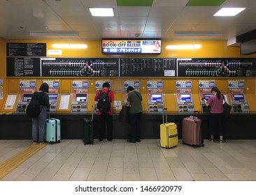 Fukuoka, Japan - August 1st 2019: People Buying Subway Ticket At Tenjin Station