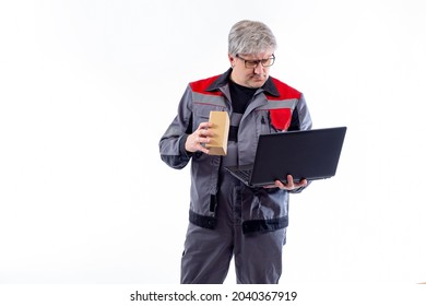 Fulfillment Process. Concept - Sales Through Online Marketplaces. Employee Of Online Retail Company. Man With Laptop Works In Fulfillment Center. Center Fulfillment Employee On White Background.